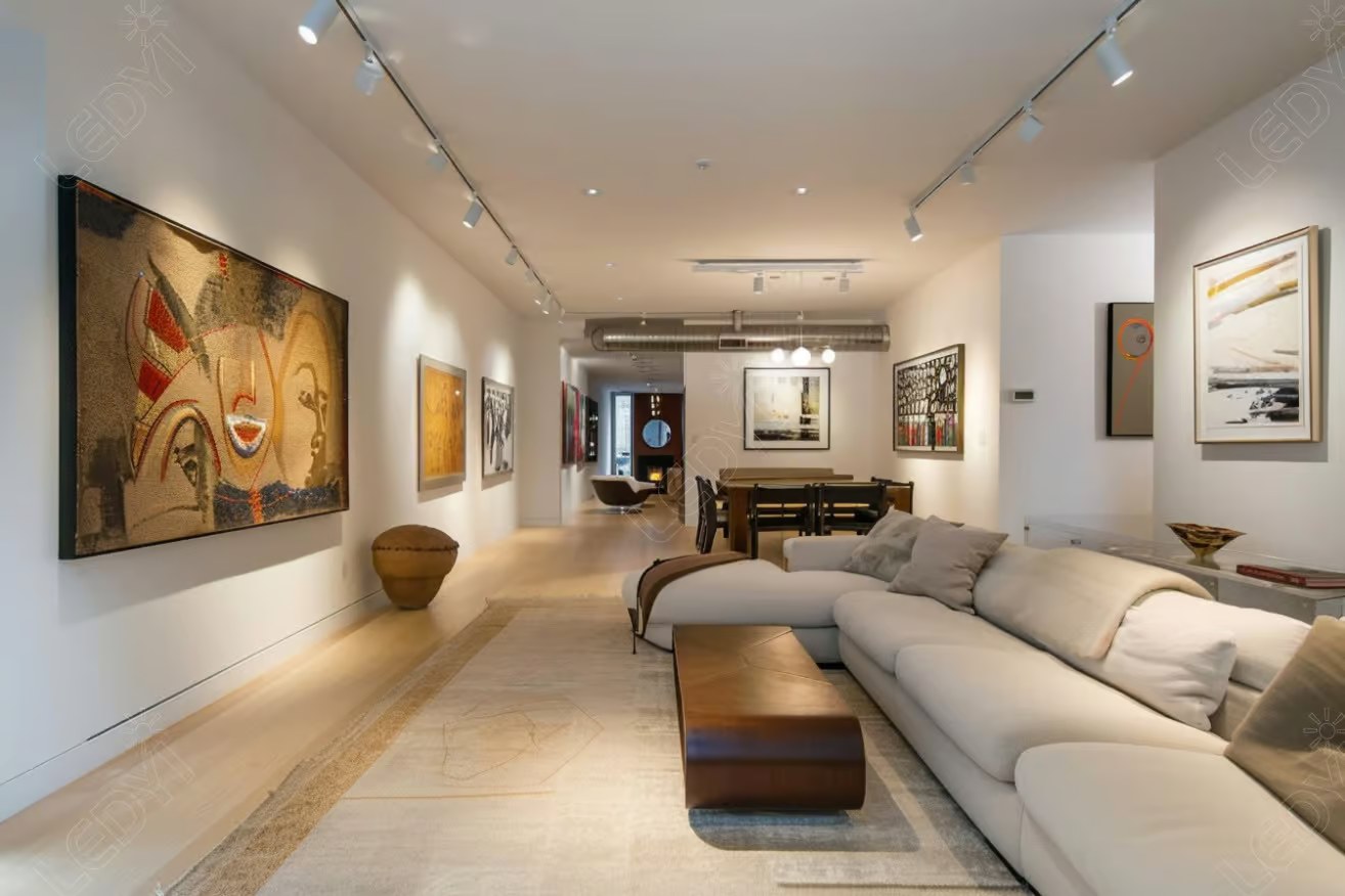 Modern living room with art on walls.