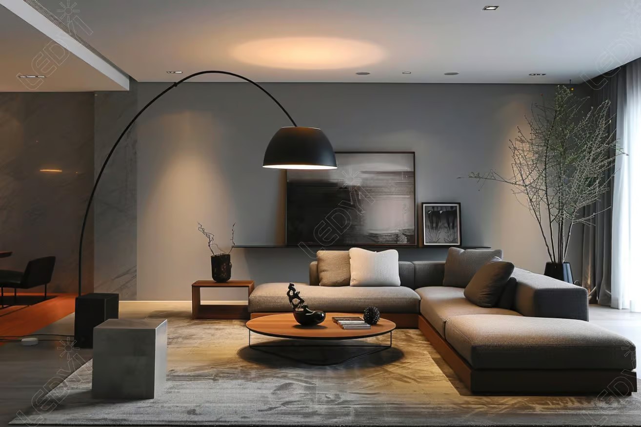Modern living room with sectional sofa and arc floor lamp.