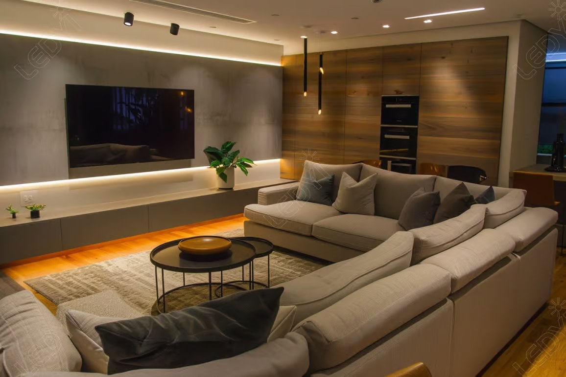 Modern living room with cozy sectional sofa and TV.