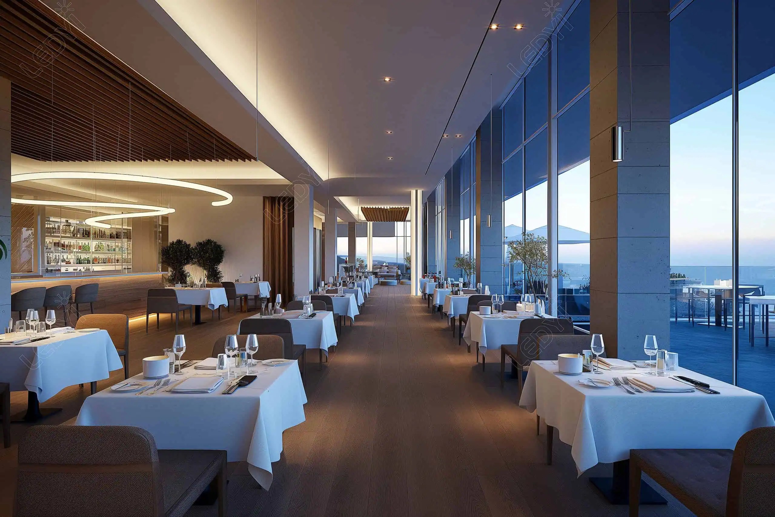 Modern restaurant with ocean views and elegant table settings.