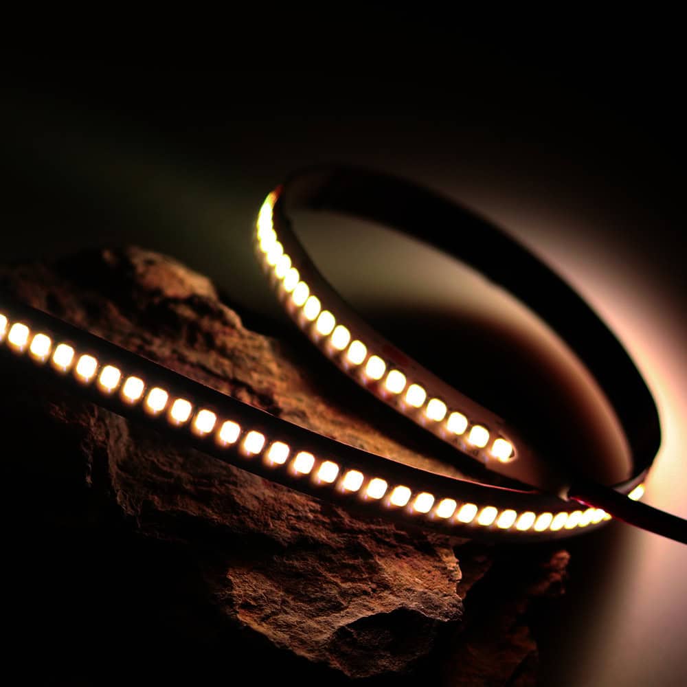 LED strip light illuminating rock surface.